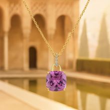 Handmade statement jewelry in sterling silver with purple gemstone