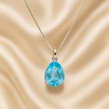 Necklace photographed flat on neutral luxury fabric