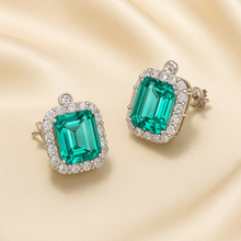 Luxury gift for women featuring statement green stone earrings
	