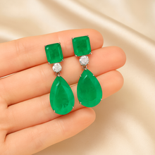 Side angle showing the brilliance of white quartz above the green drops