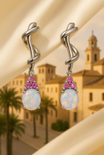 “Exclusive Curación Holística opal and ruby earrings handmade for balance and passion”