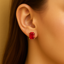 Luxury packaging of Curación Holística ruby earrings, ready for gifting.”