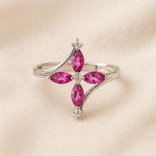 	Ruby and white quartz energy ring, boho style, artisan-crafted