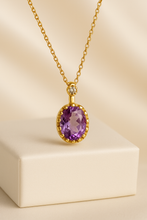 Oval amethyst necklace with white quartz detail