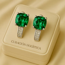 Sterling silver earrings featuring vibrant green cushion-cut gemstones