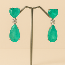 Sterling silver earrings with vibrant turquoise gemstones
