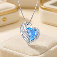 Guardian Angel Blue Topaz Heart Necklace | Handmade Sterling Silver 925 Angel Wings Statement Pendant | Limited Edition Curación Holistica Spanish Jewelry