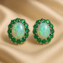 “Elegant sterling silver statement earrings with opal center and emerald halo”