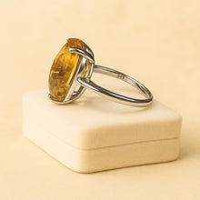 “Close-up of adjustable shank mechanism on sterling-silver citrine statement ring.”