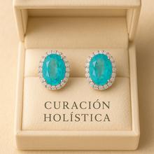 Paraiba earrings reflecting premium studio lighting and sparkle