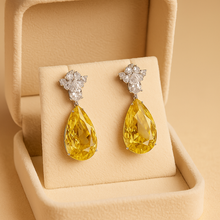 Matching citrine earrings showing stone clarity and craftsmanship”