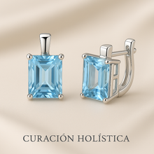 	Cushion-cut aquamarine earrings in sterling silver on glossy white background
