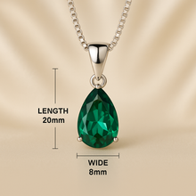 Elegant green nano-emerald pendant on silver chain.