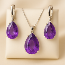 	Amethyst jewelry set with teardrop earrings and necklace in sterling silver