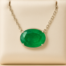 Artistic flat lay with the necklace and natural healing elements (e.g., leaves, crystals)