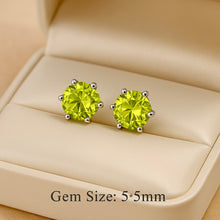 5mm round green peridot stones set in sterling silver