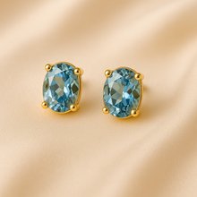 	Elegant Aquamarine and Gold Stud Earrings for Women