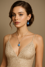 Model wearing the necklace outdoors at golden hour