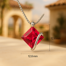 Close-up of elegant ruby necklace with modern square design