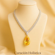 Gift-ready packaging with Curación Holística branding and jewelry care card”
