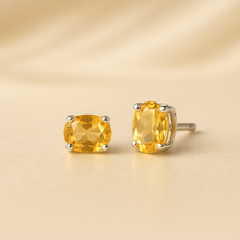 	Boho-style handmade gemstone earrings featuring yellow citrine