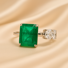 Close-up of green nano emerald gemstone set in sterling silver ring
