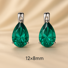“Luxury handmade Nano-Emerald statement earrings in sterling silver, featuring teardrop green gemstones for boho elegance.”