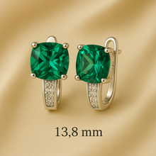 Artisan-crafted emerald green earrings exclusive to Curación Holística
