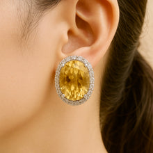 Heirloom-quality handmade sterling silver earrings with citrine