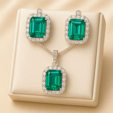 Rectangular green gemstone earrings with diamond-like halo in silver