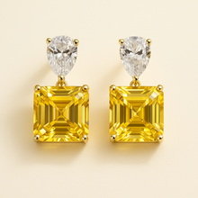 Golden yellow gemstone earrings with white quartz accents