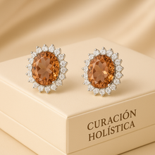 Sterling silver gemstone stud earrings on luxury cream box