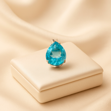 Side angle showing teardrop depth and setting craftsmanship