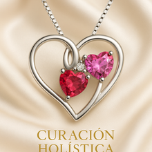 Side angle view of ruby and rose topaz heart pendant necklace highlighting delicate silver setting.”