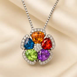 “Handmade multicolor gemstone flower pendant in sterling silver - Curación Holística”