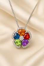 “Handmade multicolor gemstone flower pendant in sterling silver - Curación Holística”