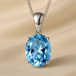 Necklace shown on a cream satin jewelry bust
