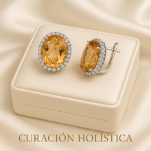 Luxury snake-inspired statement earrings by Curación Holística