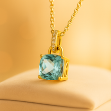 Close-up of cushion-cut aquamarine gemstone pendant