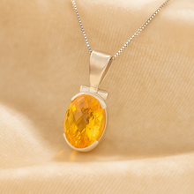 	Healing gemstone necklace with warm amber tones