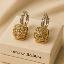 Close-up of elegant artisanal earrings with white quartz mosaic