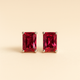 Ruby rose stud earrings on a satin cream box, luxury jewelry styling