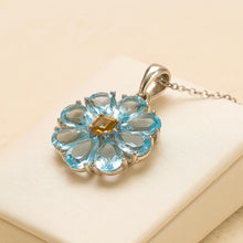 Floral-shaped natural aquamarine pendant with handmade craftsmanship.