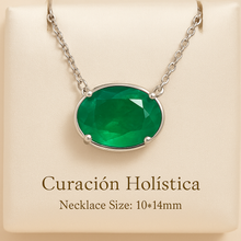 Elegant gift box packaging with “Curación Holística” logo and jewelry inside
	