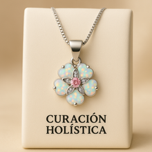 “Imagine a soft sunrise woven into a bloom of precious stones—each opal petal catching the first light of morning, while a tender rose quartz heart hums quietly at its center. With this necklace, you don’t just wear jewelry; you wear a promise of beauty, love, and renewal crafted by hand, and kissed by the spirit of Curación Holística.”