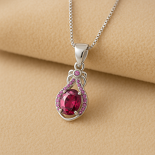 “Luxury packaging featuring Curación Holística handmade ruby necklace ready for gifting.”