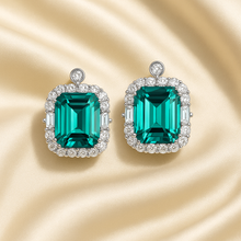High-quality emerald earrings with spiritual energy symbolism