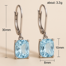 Side profile of aquamarine earrings showing gemstone setting
