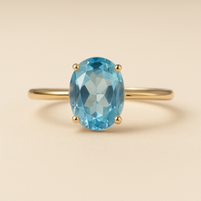 Gold-plated sterling silver ring with oval aquamarine gemstone – top view
