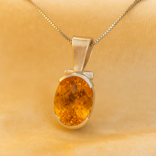 	Handmade citrine statement necklace with oval gemstone